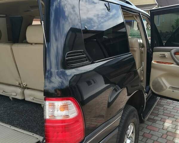 Черный Лексус ЛХ, объемом двигателя 4.7 л и пробегом 232 тыс. км за 14800 $, фото 6 на Automoto.ua