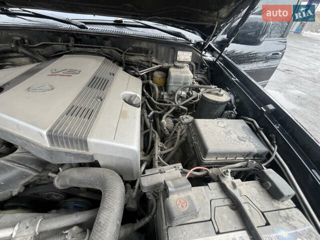 Черный Лексус ЛХ, объемом двигателя 4.6 л и пробегом 300 тыс. км за 13777 $, фото 58 на Automoto.ua