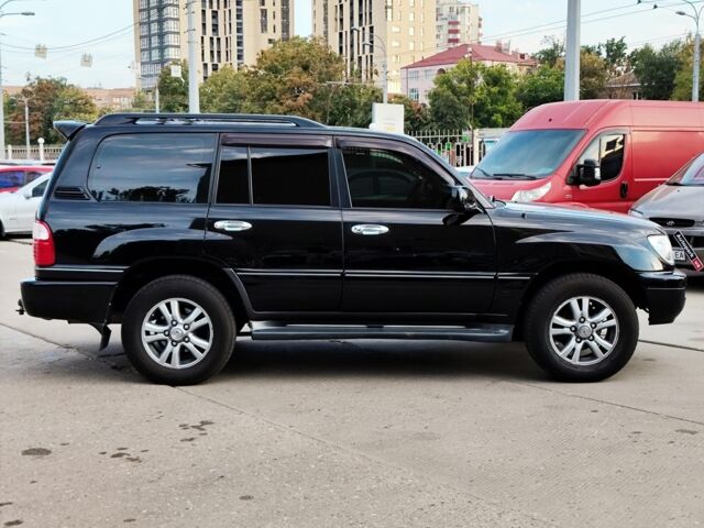 Черный Лексус ЛХ, объемом двигателя 4.7 л и пробегом 313 тыс. км за 13790 $, фото 9 на Automoto.ua