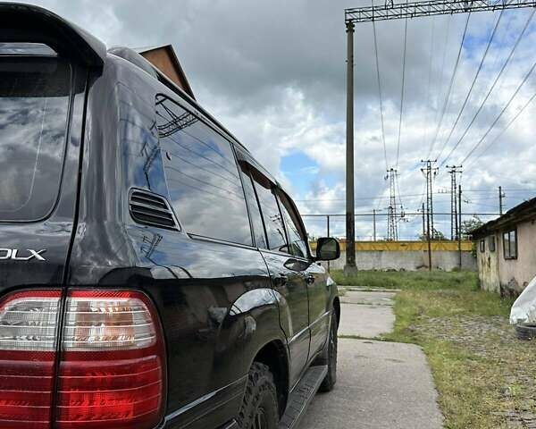 Лексус ЛХ 2005 в Мукачеве на Automoto.ua Черный Лексус ЛХ, объемом двигателя 4.66 л и пробегом 297 тыс. км за 11800 $, фото 11 на Automoto.ua