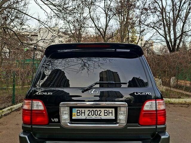 Черный Лексус ЛХ, объемом двигателя 4.7 л и пробегом 300 тыс. км за 12000 $, фото 3 на Automoto.ua