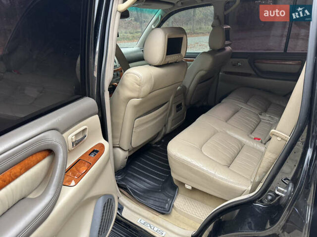 Черный Лексус ЛХ, объемом двигателя 4.7 л и пробегом 300 тыс. км за 14900 $, фото 21 на Automoto.ua