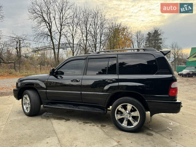 Черный Лексус ЛХ, объемом двигателя 4.7 л и пробегом 300 тыс. км за 14900 $, фото 6 на Automoto.ua