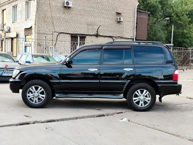 Черный Лексус ЛХ, объемом двигателя 4.7 л и пробегом 313 тыс. км за 13790 $, фото 2 на Automoto.ua