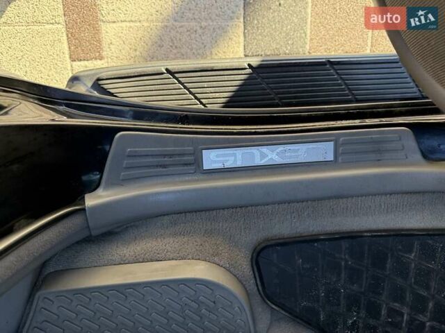 Черный Лексус ЛХ, объемом двигателя 4.66 л и пробегом 292 тыс. км за 12800 $, фото 14 на Automoto.ua