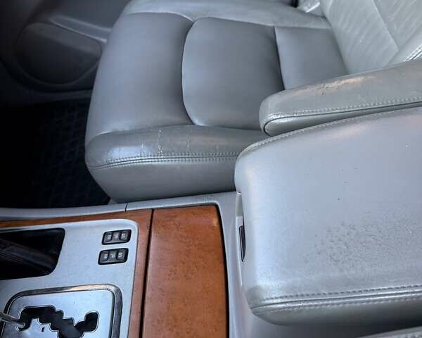 Черный Лексус ЛХ, объемом двигателя 4.66 л и пробегом 292 тыс. км за 12800 $, фото 7 на Automoto.ua