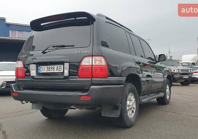Черный Лексус ЛХ, объемом двигателя 4.66 л и пробегом 171 тыс. км за 12000 $, фото 2 на Automoto.ua