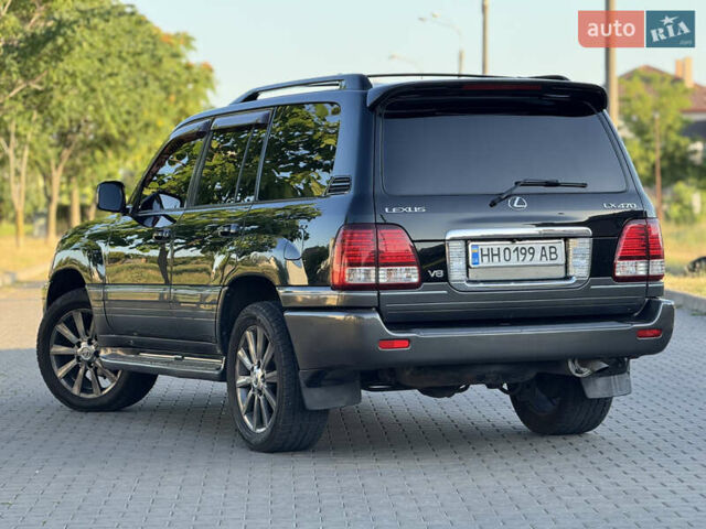 Черный Лексус ЛХ, объемом двигателя 4.7 л и пробегом 287 тыс. км за 15300 $, фото 9 на Automoto.ua
