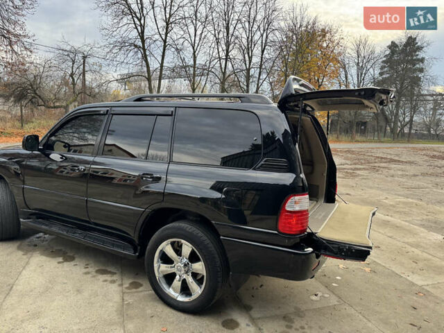 Черный Лексус ЛХ, объемом двигателя 4.7 л и пробегом 300 тыс. км за 14900 $, фото 11 на Automoto.ua