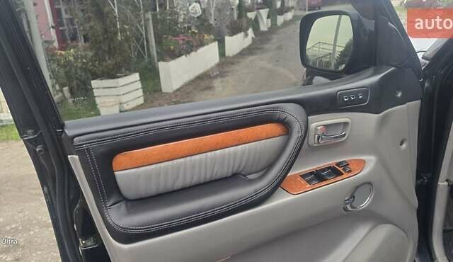 Черный Лексус ЛХ, объемом двигателя 4.7 л и пробегом 370 тыс. км за 14800 $, фото 1 на Automoto.ua