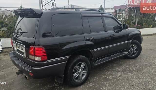 Черный Лексус ЛХ, объемом двигателя 4.7 л и пробегом 370 тыс. км за 14800 $, фото 12 на Automoto.ua