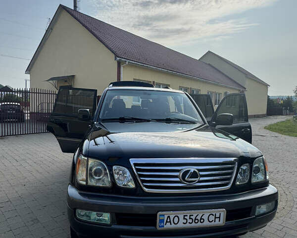 Черный Лексус ЛХ, объемом двигателя 4.66 л и пробегом 352 тыс. км за 15600 $, фото 1 на Automoto.ua