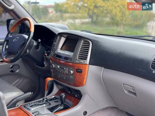 Чорний Лексус ЛХ, об'ємом двигуна 4.66 л та пробігом 291 тис. км за 12500 $, фото 12 на Automoto.ua