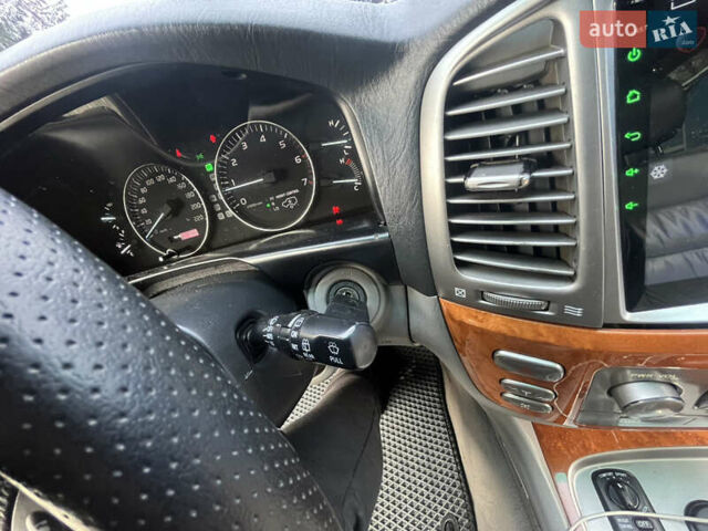 Черный Лексус ЛХ, объемом двигателя 4.6 л и пробегом 300 тыс. км за 13777 $, фото 52 на Automoto.ua