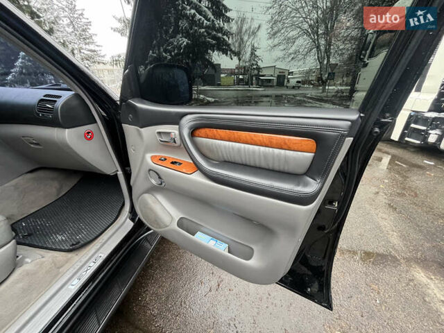 Черный Лексус ЛХ, объемом двигателя 4.6 л и пробегом 300 тыс. км за 13777 $, фото 33 на Automoto.ua
