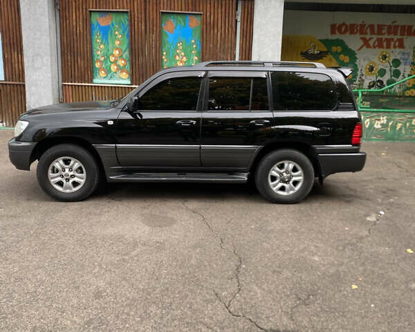 Черный Лексус ЛХ, объемом двигателя 4.66 л и пробегом 298 тыс. км за 15600 $, фото 6 на Automoto.ua