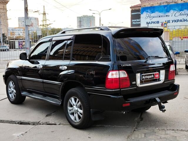 Черный Лексус ЛХ, объемом двигателя 4.7 л и пробегом 313 тыс. км за 13790 $, фото 3 на Automoto.ua