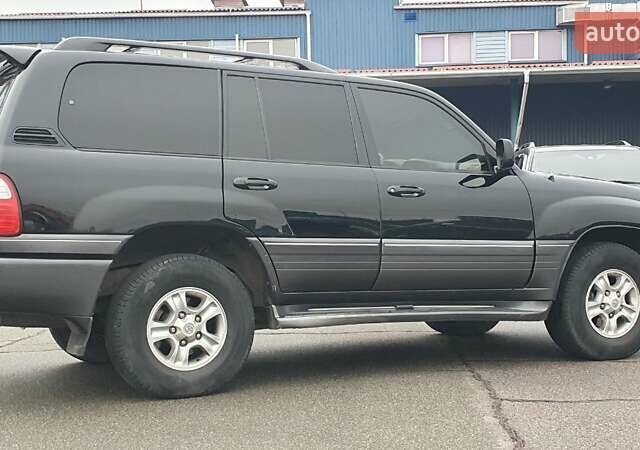 Черный Лексус ЛХ, объемом двигателя 4.66 л и пробегом 171 тыс. км за 12000 $, фото 5 на Automoto.ua