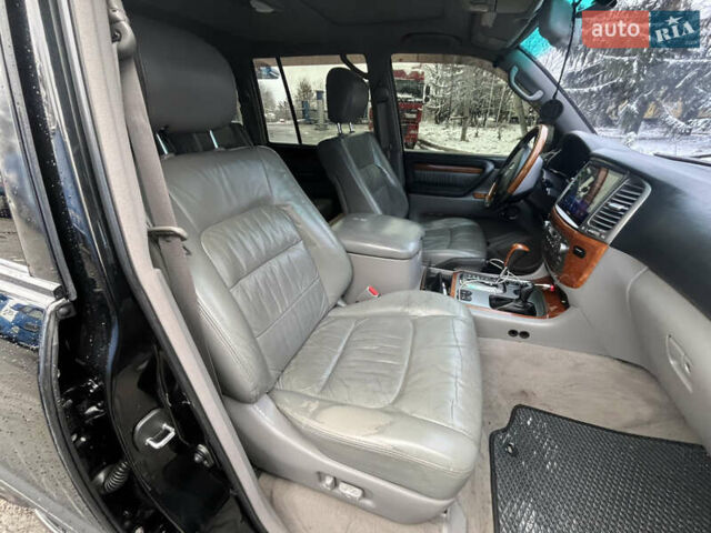 Черный Лексус ЛХ, объемом двигателя 4.6 л и пробегом 300 тыс. км за 13777 $, фото 34 на Automoto.ua