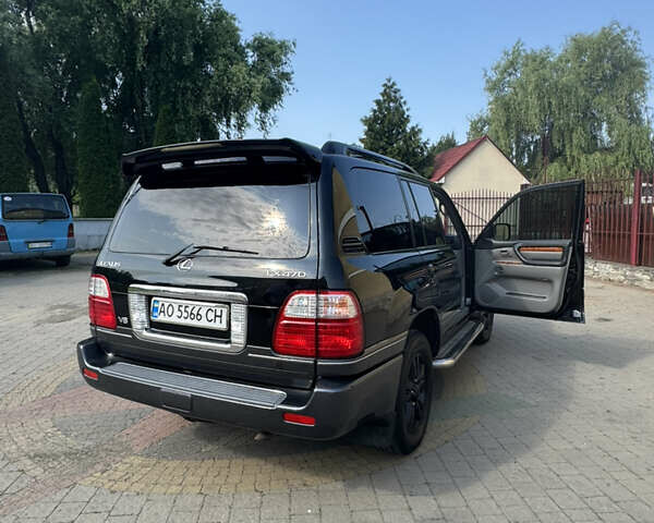 Черный Лексус ЛХ, объемом двигателя 4.66 л и пробегом 352 тыс. км за 15600 $, фото 5 на Automoto.ua