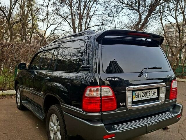 Черный Лексус ЛХ, объемом двигателя 4.7 л и пробегом 300 тыс. км за 12000 $, фото 4 на Automoto.ua