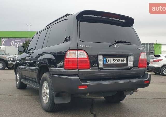 Черный Лексус ЛХ, объемом двигателя 4.66 л и пробегом 171 тыс. км за 12000 $, фото 3 на Automoto.ua