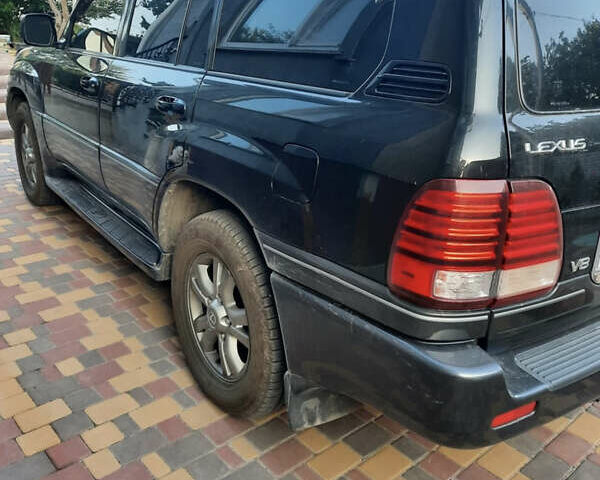 Черный Лексус ЛХ, объемом двигателя 4.66 л и пробегом 290 тыс. км за 14000 $, фото 2 на Automoto.ua