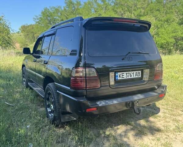 Черный Лексус ЛХ, объемом двигателя 4.66 л и пробегом 400 тыс. км за 14000 $, фото 4 на Automoto.ua