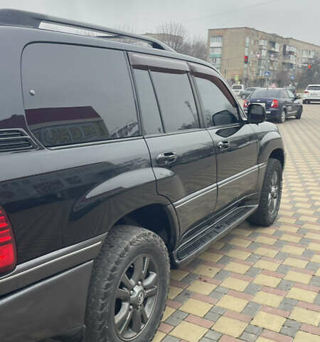 Чорний Лексус ЛХ, об'ємом двигуна 4.66 л та пробігом 305 тис. км за 17000 $, фото 5 на Automoto.ua