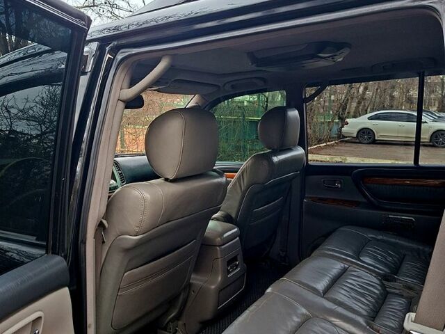 Черный Лексус ЛХ, объемом двигателя 4.7 л и пробегом 300 тыс. км за 12000 $, фото 5 на Automoto.ua