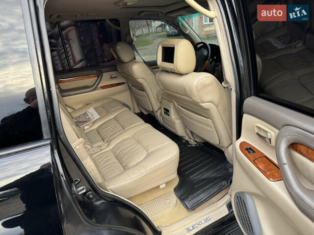 Черный Лексус ЛХ, объемом двигателя 4.7 л и пробегом 300 тыс. км за 14900 $, фото 20 на Automoto.ua