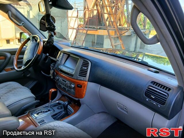 Черный Лексус ЛХ, объемом двигателя 4.7 л и пробегом 283 тыс. км за 16500 $, фото 6 на Automoto.ua
