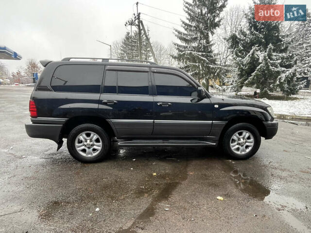 Черный Лексус ЛХ, объемом двигателя 4.6 л и пробегом 300 тыс. км за 13777 $, фото 24 на Automoto.ua