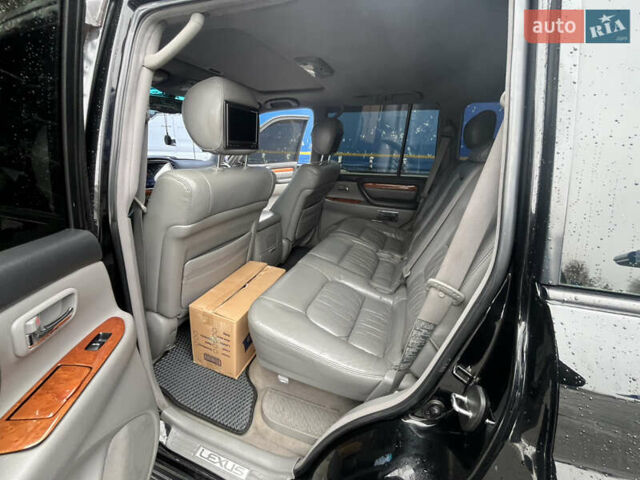 Черный Лексус ЛХ, объемом двигателя 4.6 л и пробегом 300 тыс. км за 13777 $, фото 41 на Automoto.ua