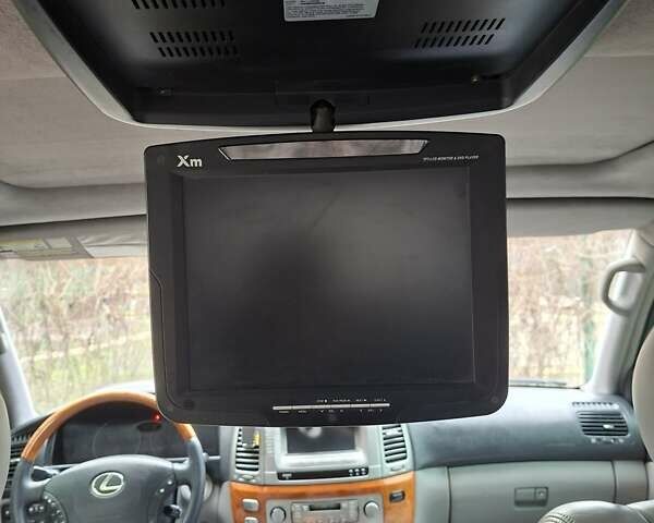 Черный Лексус ЛХ, объемом двигателя 4.66 л и пробегом 300 тыс. км за 12000 $, фото 5 на Automoto.ua