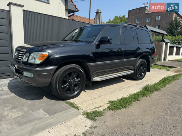 Черный Лексус ЛХ, объемом двигателя 4.66 л и пробегом 352 тыс. км за 15600 $, фото 4 на Automoto.ua