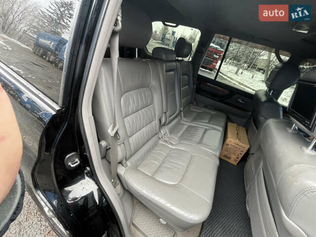 Черный Лексус ЛХ, объемом двигателя 4.6 л и пробегом 300 тыс. км за 13777 $, фото 31 на Automoto.ua