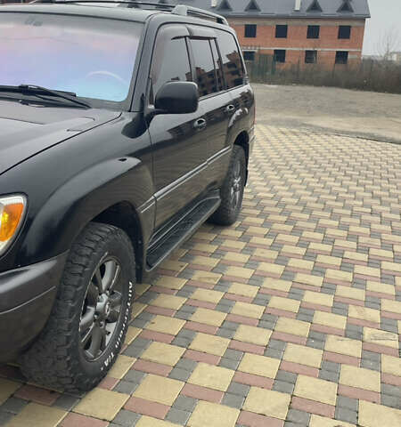 Чорний Лексус ЛХ, об'ємом двигуна 4.66 л та пробігом 305 тис. км за 17000 $, фото 1 на Automoto.ua