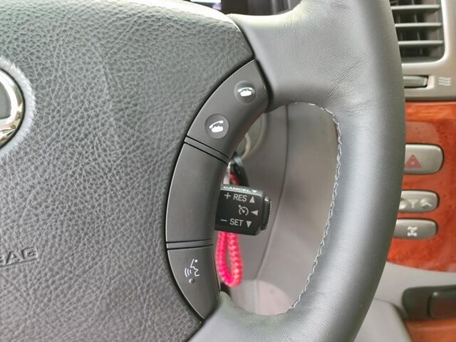 Черный Лексус ЛХ, объемом двигателя 4.7 л и пробегом 313 тыс. км за 13790 $, фото 26 на Automoto.ua