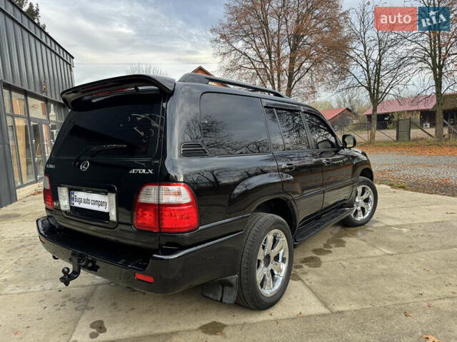 Черный Лексус ЛХ, объемом двигателя 4.7 л и пробегом 300 тыс. км за 14900 $, фото 3 на Automoto.ua