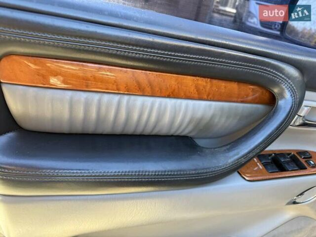 Черный Лексус ЛХ, объемом двигателя 4.66 л и пробегом 292 тыс. км за 12800 $, фото 9 на Automoto.ua