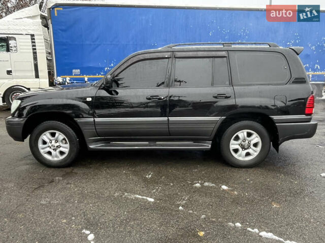 Черный Лексус ЛХ, объемом двигателя 4.6 л и пробегом 300 тыс. км за 13777 $, фото 12 на Automoto.ua