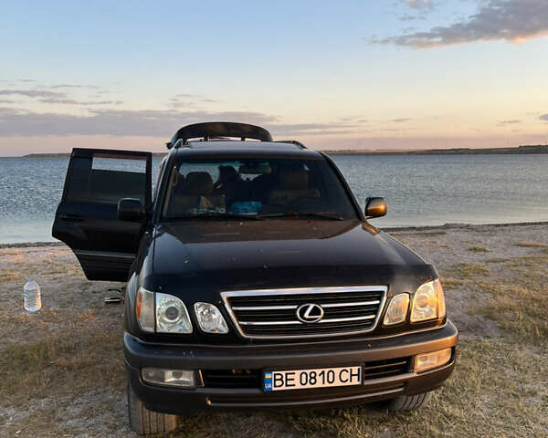 Черный Лексус ЛХ, объемом двигателя 4.66 л и пробегом 290 тыс. км за 14000 $, фото 4 на Automoto.ua