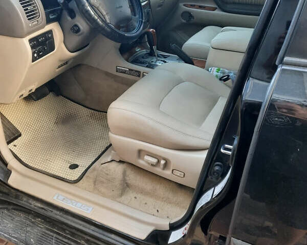 Черный Лексус ЛХ, объемом двигателя 4.66 л и пробегом 290 тыс. км за 14000 $, фото 3 на Automoto.ua