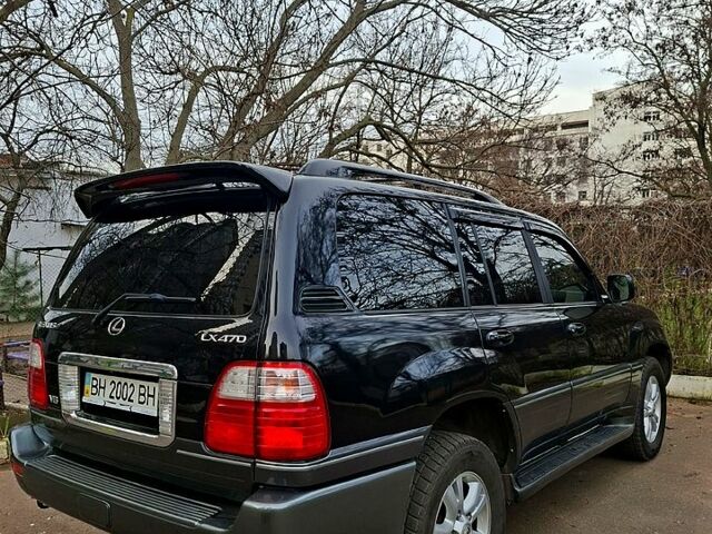 Черный Лексус ЛХ, объемом двигателя 4.7 л и пробегом 300 тыс. км за 12000 $, фото 2 на Automoto.ua