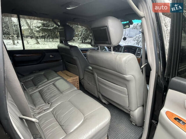 Черный Лексус ЛХ, объемом двигателя 4.6 л и пробегом 300 тыс. км за 13777 $, фото 25 на Automoto.ua