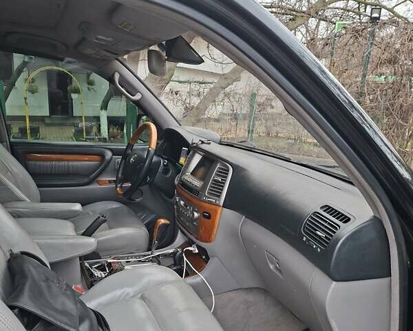Черный Лексус ЛХ, объемом двигателя 4.66 л и пробегом 300 тыс. км за 12000 $, фото 11 на Automoto.ua