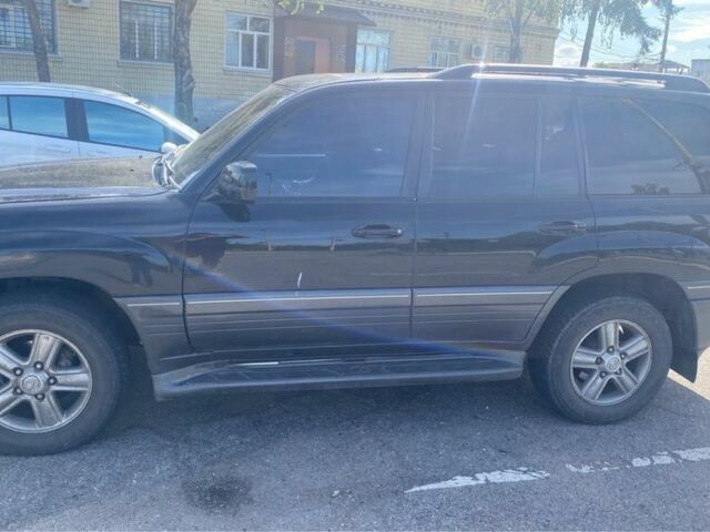 Черный Лексус ЛХ, объемом двигателя 4.7 л и пробегом 230 тыс. км за 10700 $, фото 2 на Automoto.ua