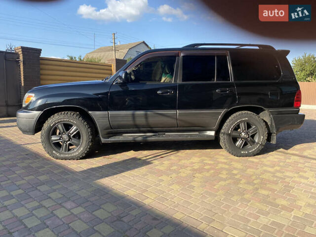 Черный Лексус ЛХ, объемом двигателя 4.67 л и пробегом 365 тыс. км за 17500 $, фото 7 на Automoto.ua