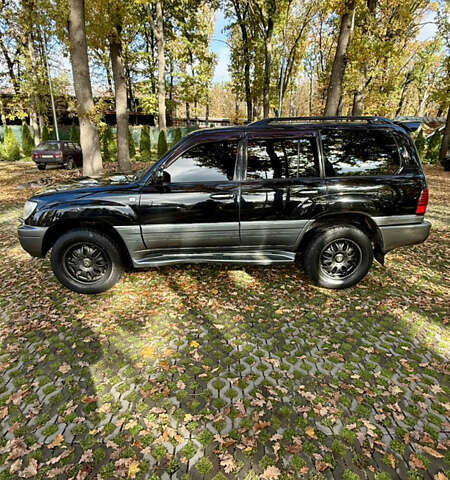 Черный Лексус ЛХ, объемом двигателя 4.7 л и пробегом 350 тыс. км за 12200 $, фото 1 на Automoto.ua